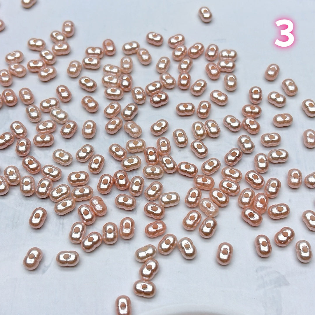 中粒アクリルピーナッツビーズ – ころんと可愛い形が魅力  42番